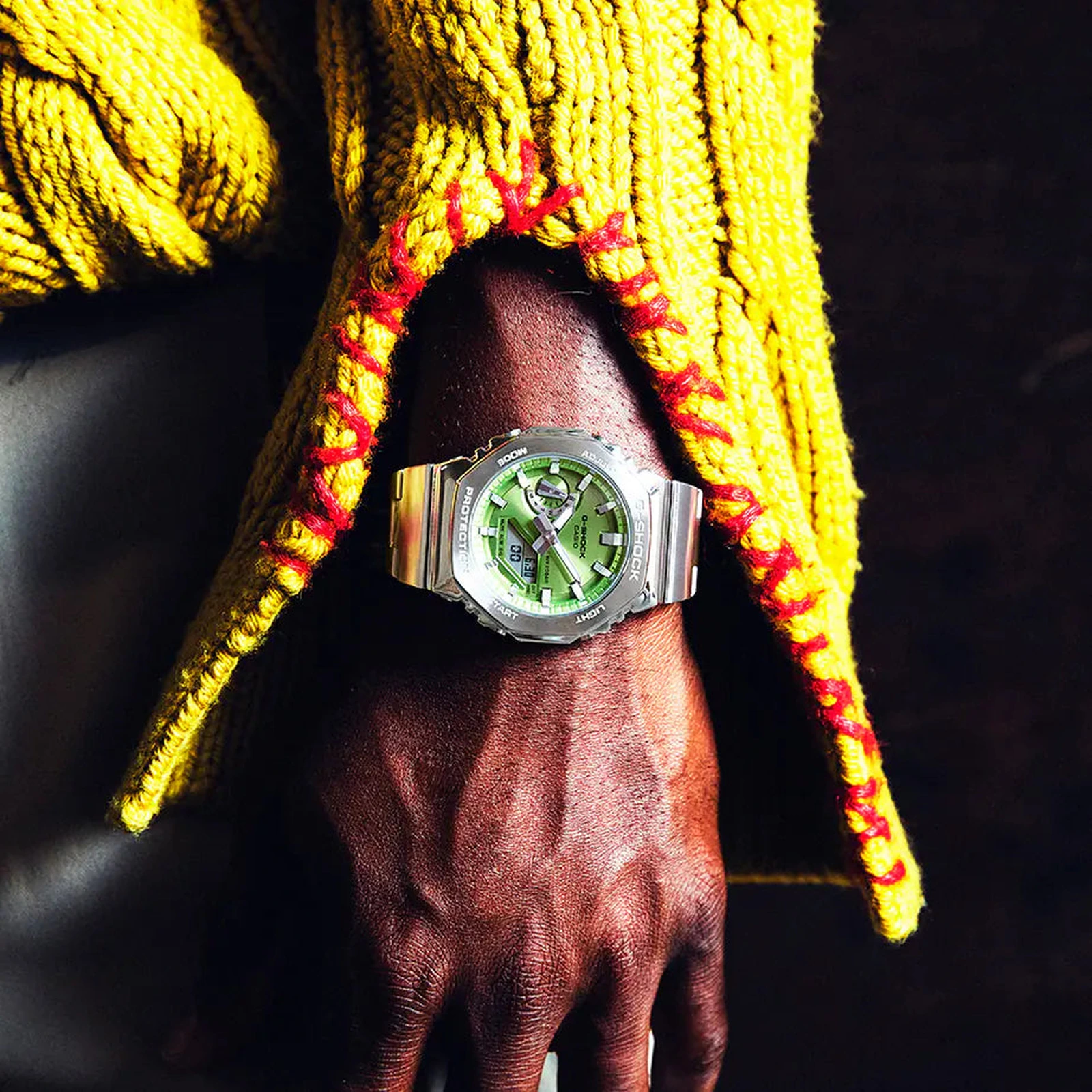 Close-up of Casio G-Shock GM-2110D-3AJF green dial watch on wrist