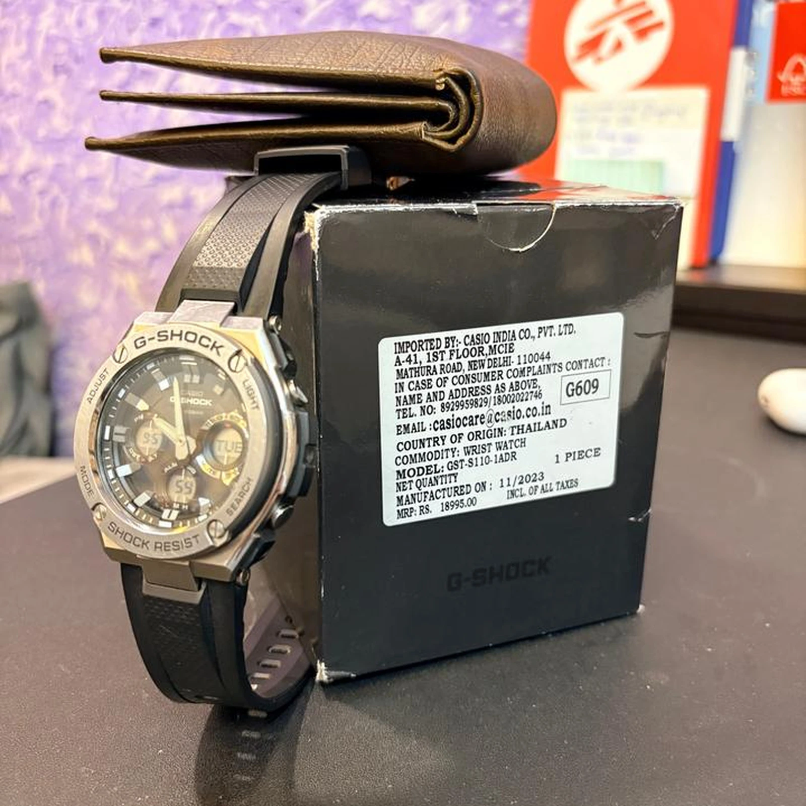 Casio G-Shock GST-S110-1ADR watch displayed with its black box