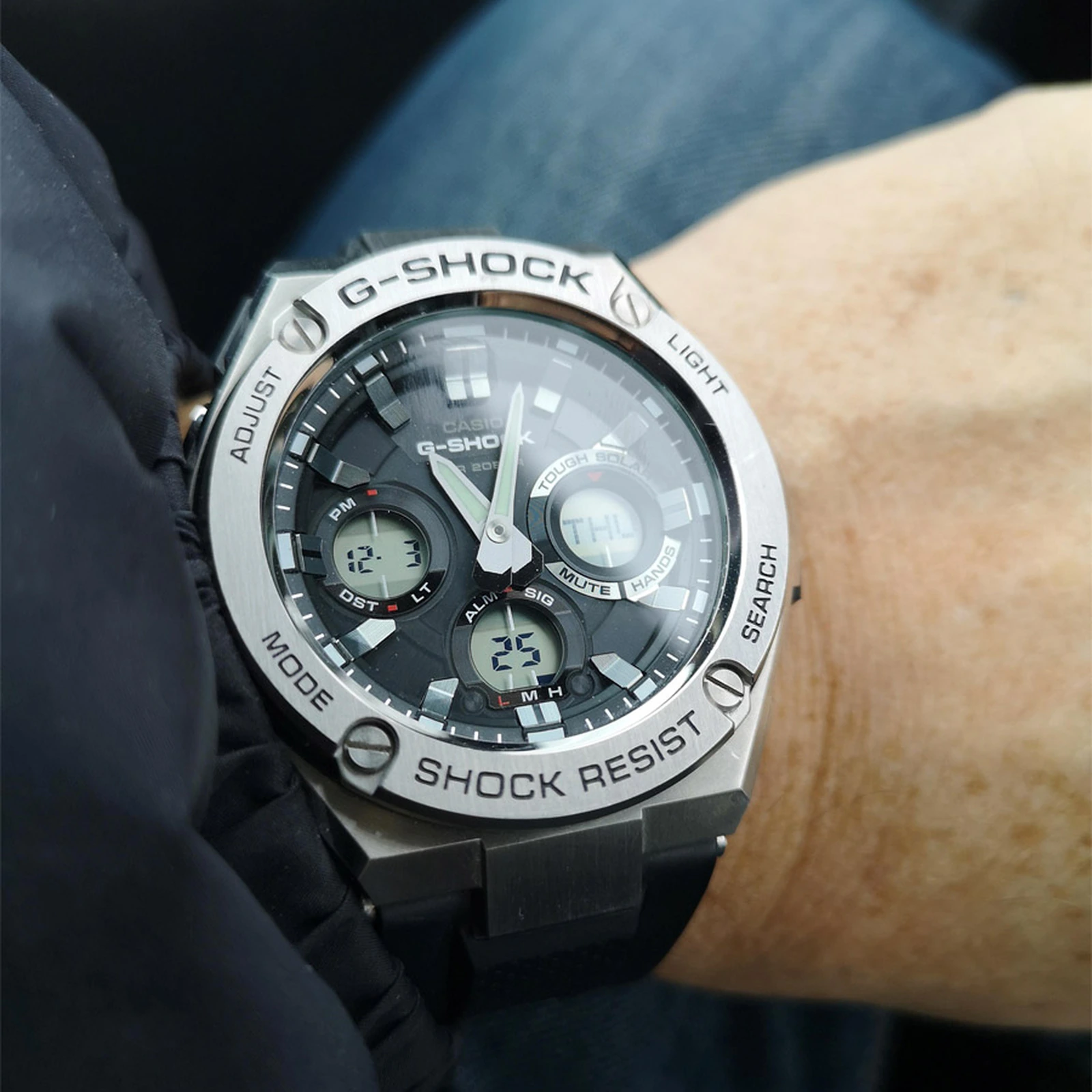 Casio G-Shock GST-S110-1ADR analogue-digital watch worn on wrist
