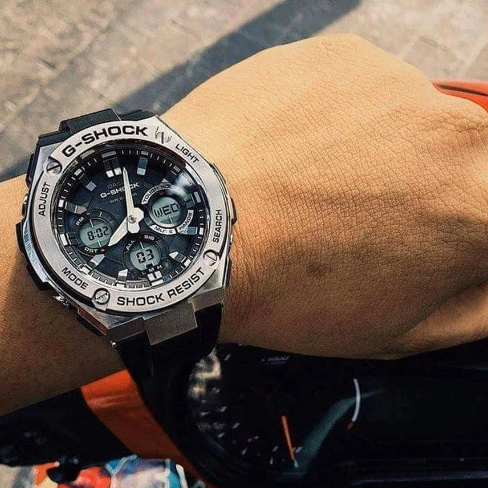 Casio G-Shock GST-S110-1ADR black and silver watch outdoors